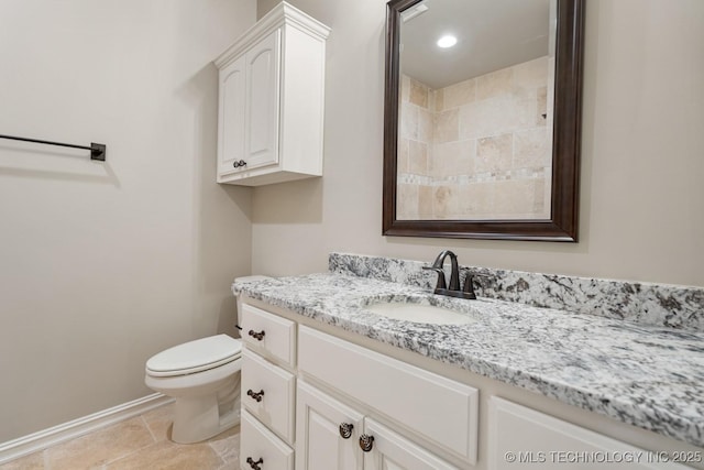 14504 E 80th St, Owasso, OK 74055 - bathroom with toilet, vanity, tile patterned floors, and baseboards