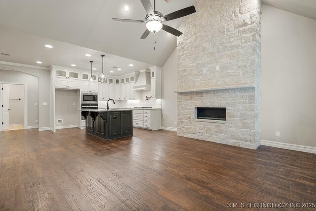 14504 E 80th St, Owasso, OK 74055 - unfurnished living room featuring recessed lighting, dark wood-style floors, a ceiling fan, a sink, and baseboards