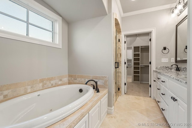14504 E 80th St, Owasso, OK 74055 - full bathroom featuring a stall shower, a spacious closet, a bath, vanity, and tile patterned flooring
