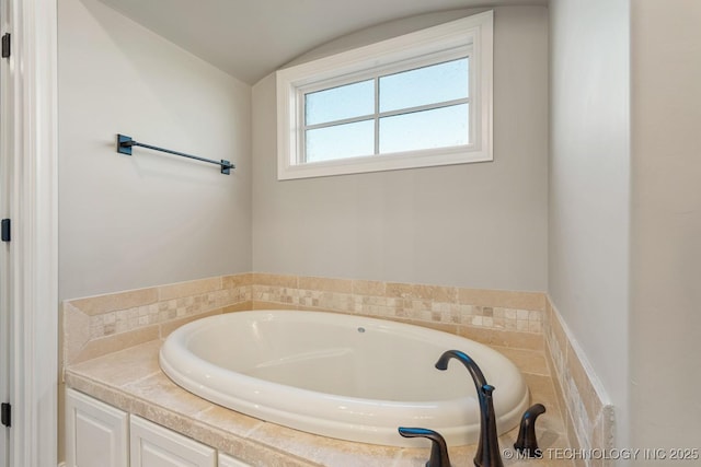 14504 E 80th St, Owasso, OK 74055 - full bath with lofted ceiling and a garden tub