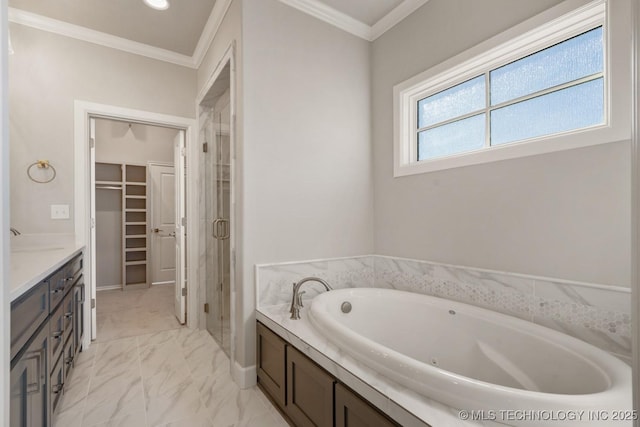 bathroom with a stall shower, ornamental molding, marble finish floor, a spacious closet, and a bath