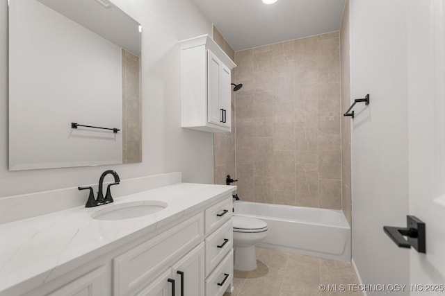 full bath with shower / bath combination, vanity, toilet, and tile patterned floors