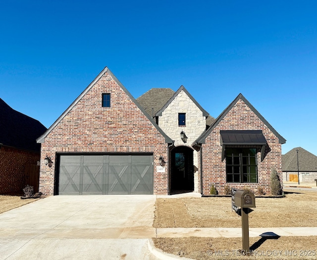 view of front of property featuring a garage