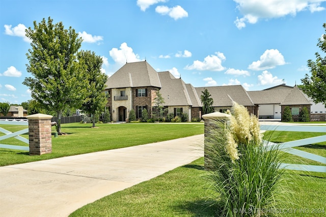 view of front of house with a front lawn