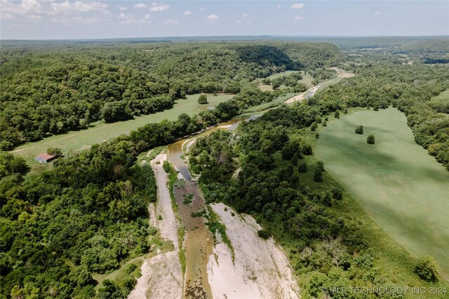 4100 N 430th Rd, Locust Grove, OK 74352 - aerial view of property's location featuring a heavily wooded area