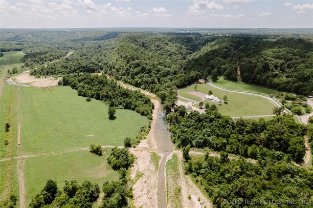 4100 N 430th Rd, Locust Grove, OK 74352 - view of rural area featuring a heavily wooded area