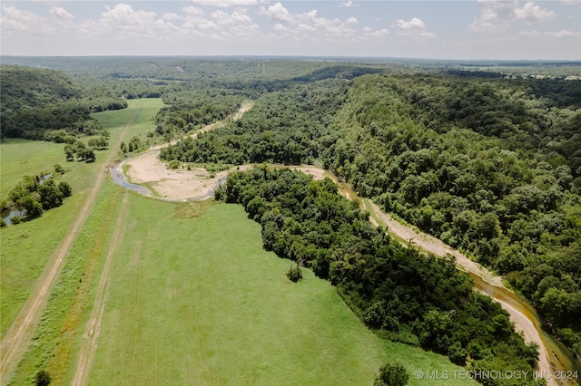 birds eye view of property featuring a rural view