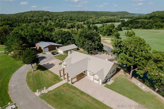 4100 N 430th Rd, Locust Grove, OK 74352 - aerial view of property and surrounding area with a heavily wooded area