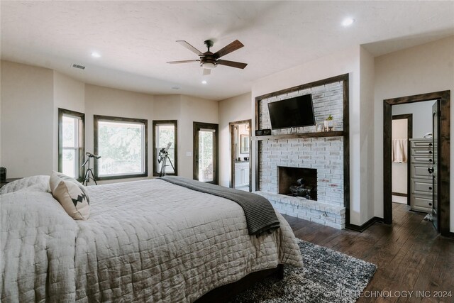 4100 N 430th Rd, Locust Grove, OK 74352 - bedroom featuring dark wood-type flooring, a brick fireplace, recessed lighting, baseboards, and ceiling fan