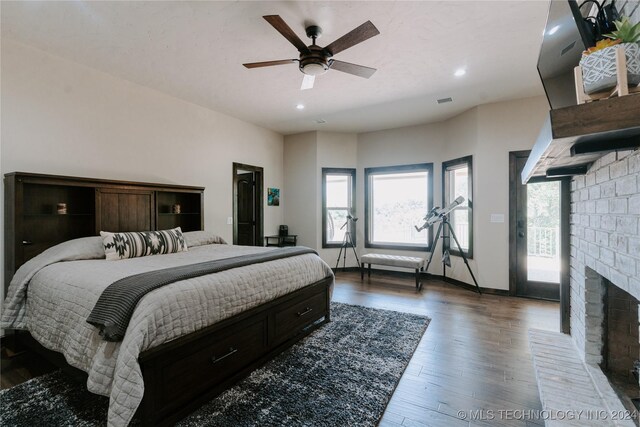4100 N 430th Rd, Locust Grove, OK 74352 - bedroom with dark wood-style floors, a brick fireplace, recessed lighting, ceiling fan, and baseboards