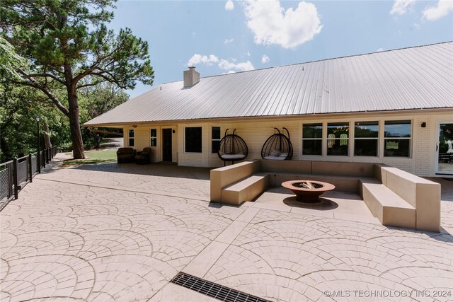 4100 N 430th Rd, Locust Grove, OK 74352 - view of patio / terrace featuring a fire pit