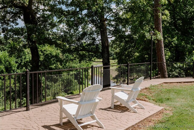 4100 N 430th Rd, Locust Grove, OK 74352 - view of patio with view of scattered trees