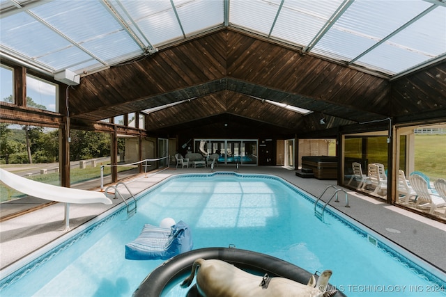 view of pool with a water slide