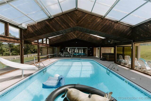 4100 N 430th Rd, Locust Grove, OK 74352 - indoor pool with a water slide, a patio area, and an outdoor hangout area