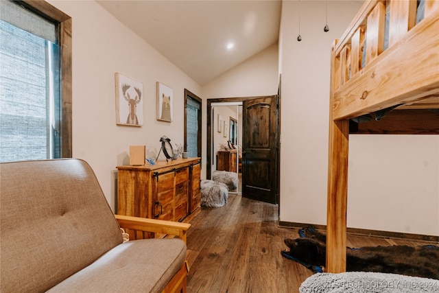 interior space featuring vaulted ceiling and dark hardwood / wood-style floors