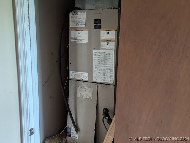 utility room with heating unit