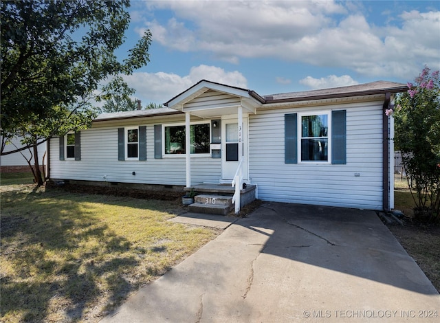 ranch-style home with a front yard and crawl space