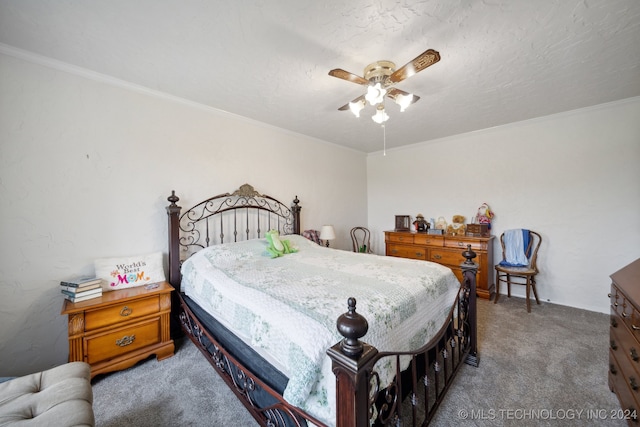 carpeted bedroom featuring ceiling fan and ornamental molding