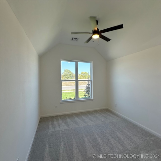 additional living space with carpet, vaulted ceiling, and ceiling fan