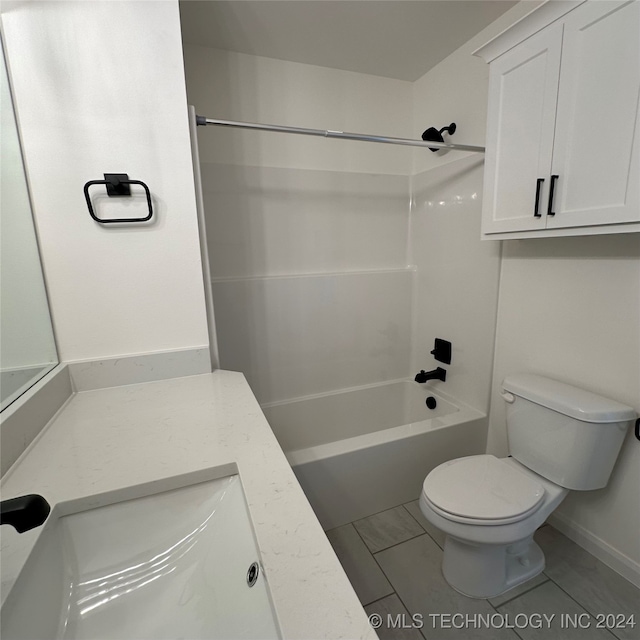 full bathroom featuring vanity, toilet, tile patterned floors, and shower / bathing tub combination