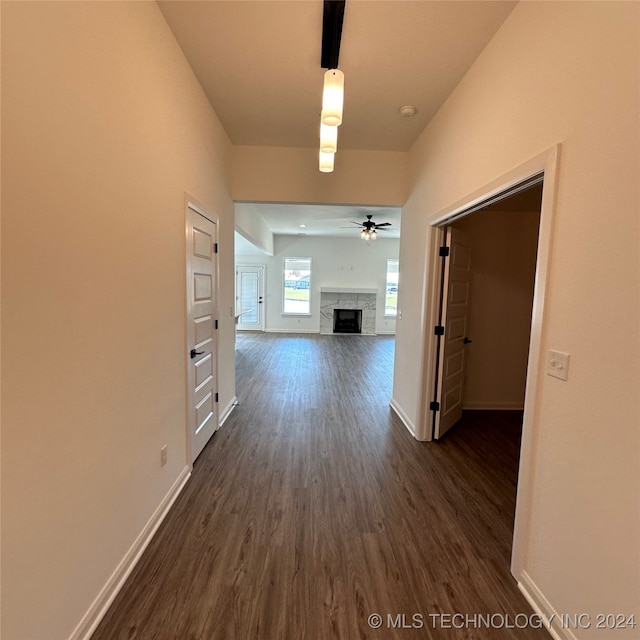 hall with dark hardwood / wood-style floors