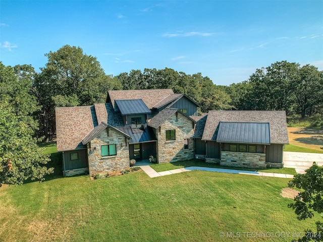 view of front of home with a front lawn