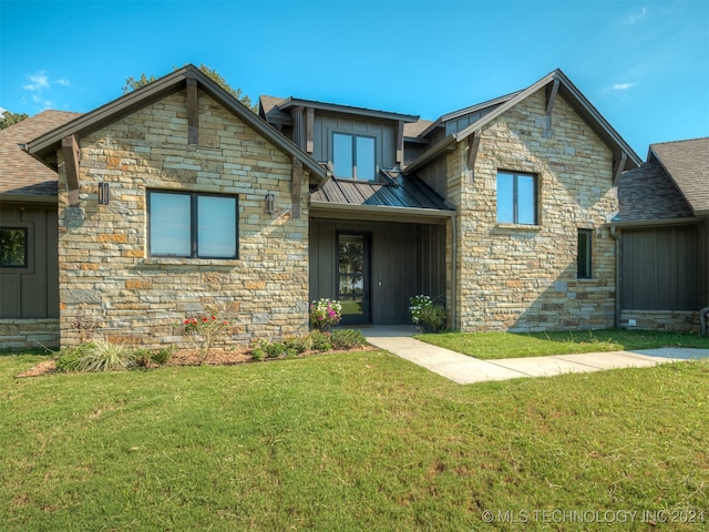 view of front of home with a front lawn