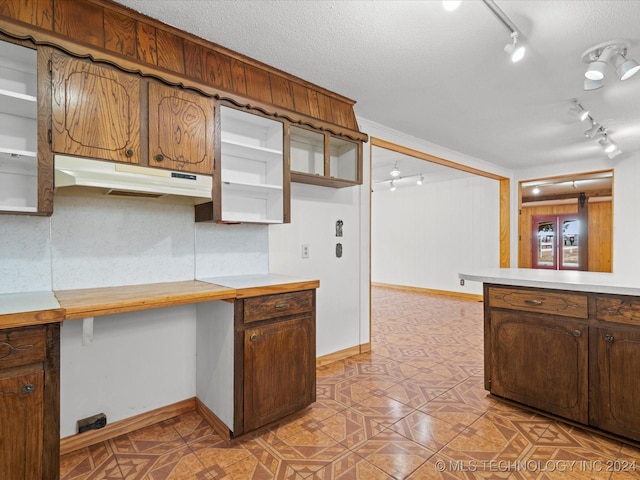 kitchen with a textured ceiling