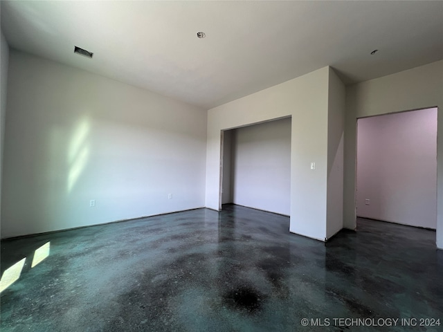 unfurnished bedroom featuring a closet