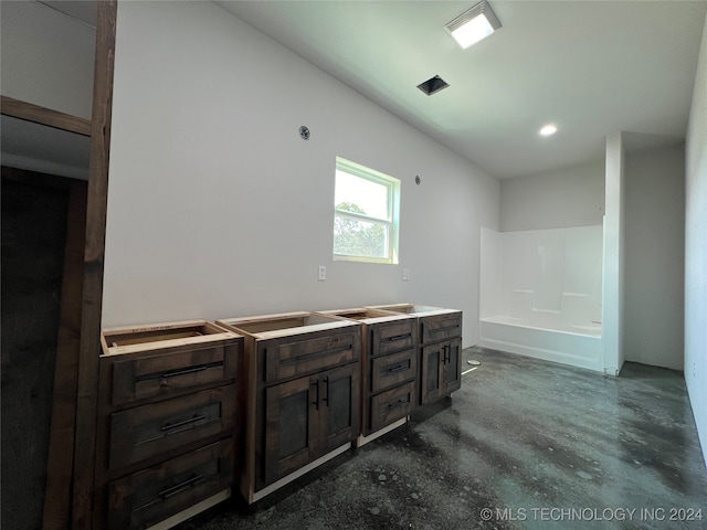 bathroom with concrete floors