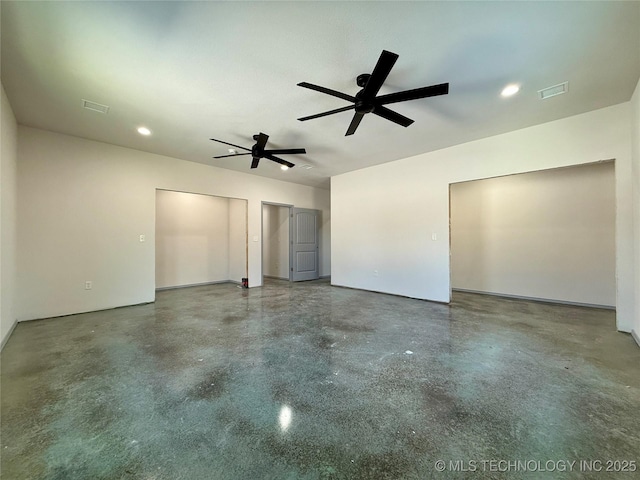 spare room with ceiling fan