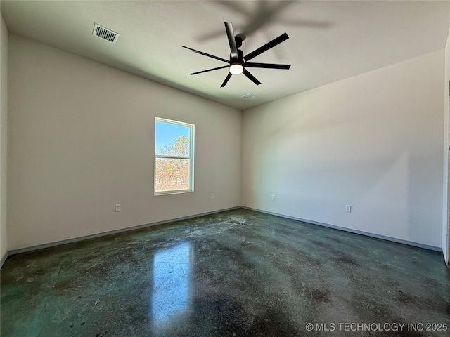 spare room with ceiling fan