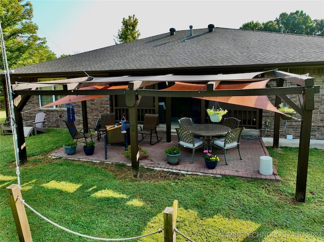 back of house with a lawn, a patio, and a gazebo