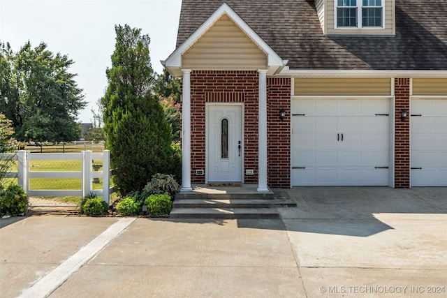 property entrance featuring a garage