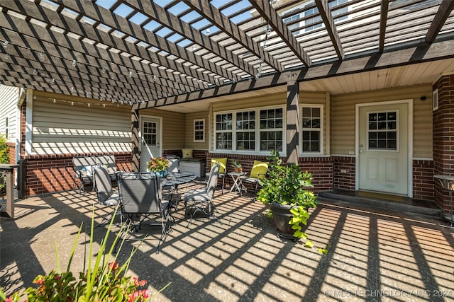 view of patio featuring a pergola