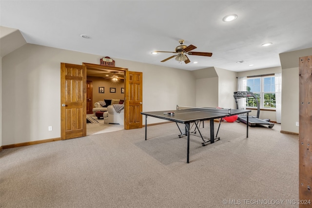 playroom with ceiling fan and light carpet