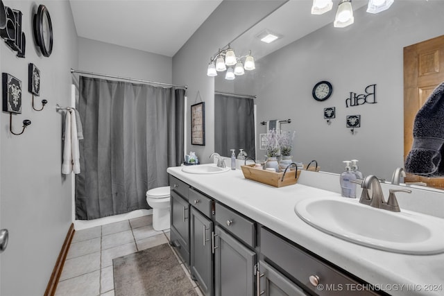 bathroom featuring tile patterned floors, walk in shower, toilet, a notable chandelier, and vanity