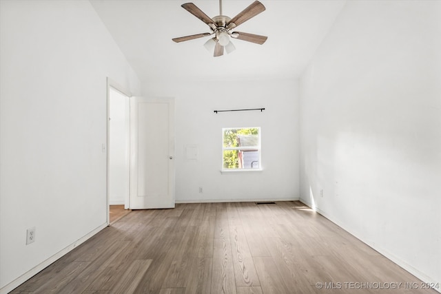 unfurnished room featuring light wood-type flooring and ceiling fan