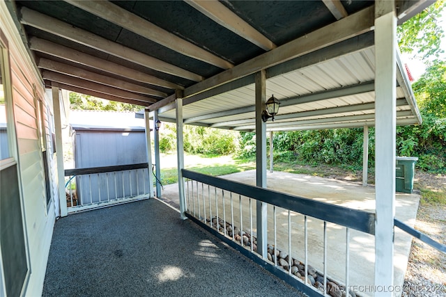 view of patio / terrace featuring a storage shed