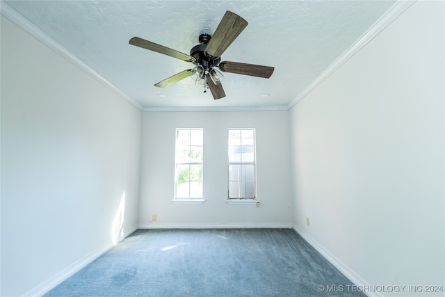 carpeted spare room with a textured ceiling, ceiling fan, and ornamental molding