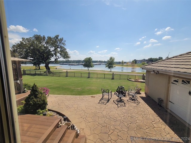 view of patio featuring a water view