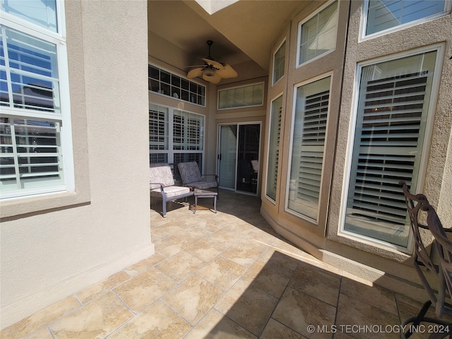 view of patio with ceiling fan