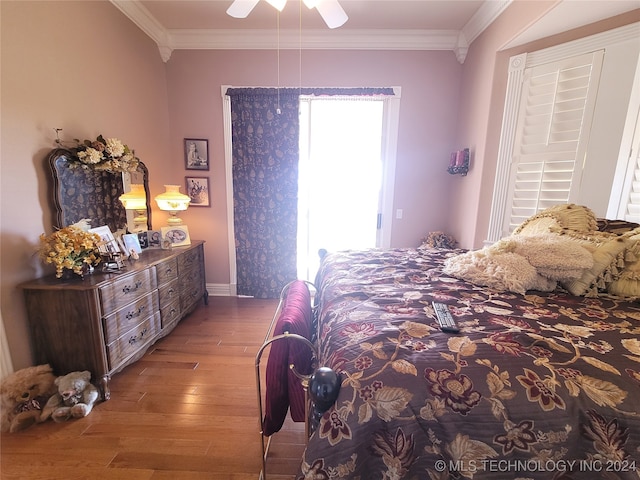 bedroom with ornamental molding, light hardwood / wood-style flooring, and ceiling fan