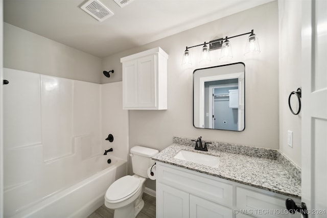 full bathroom featuring bathtub / shower combination, wood-type flooring, toilet, and vanity