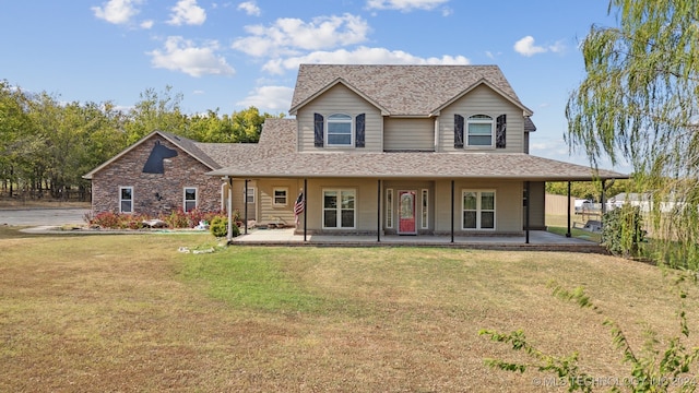 farmhouse featuring a porch and a front lawn