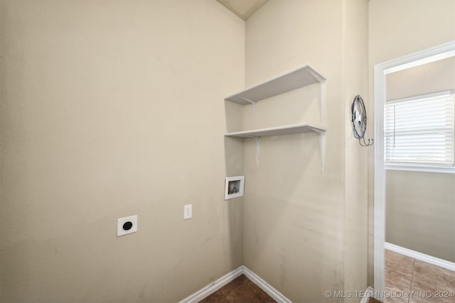 washroom featuring washer hookup, tile patterned floors, and electric dryer hookup