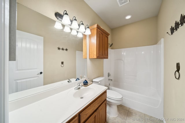 full bathroom with tile patterned floors, vanity, toilet, and shower / tub combination