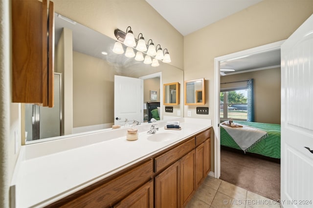 bathroom with tile patterned flooring and vanity