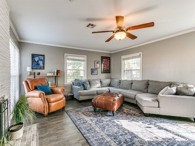 living room featuring ornamental molding, ceiling fan, and dark hardwood / wood-style floors