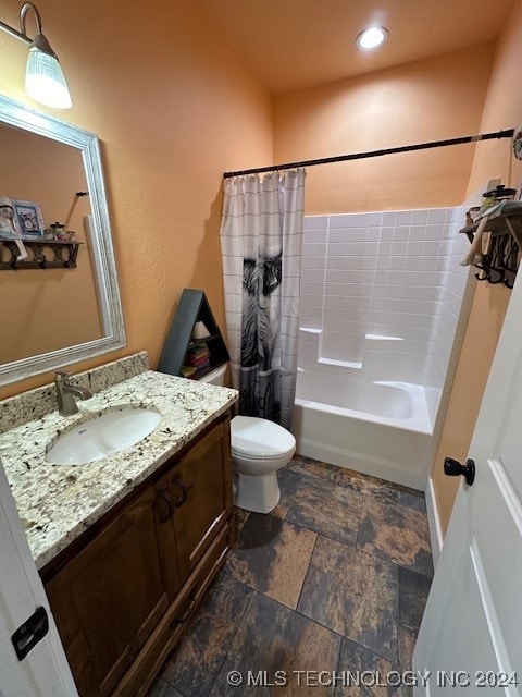 full bathroom with vanity, toilet, and shower / tub combo